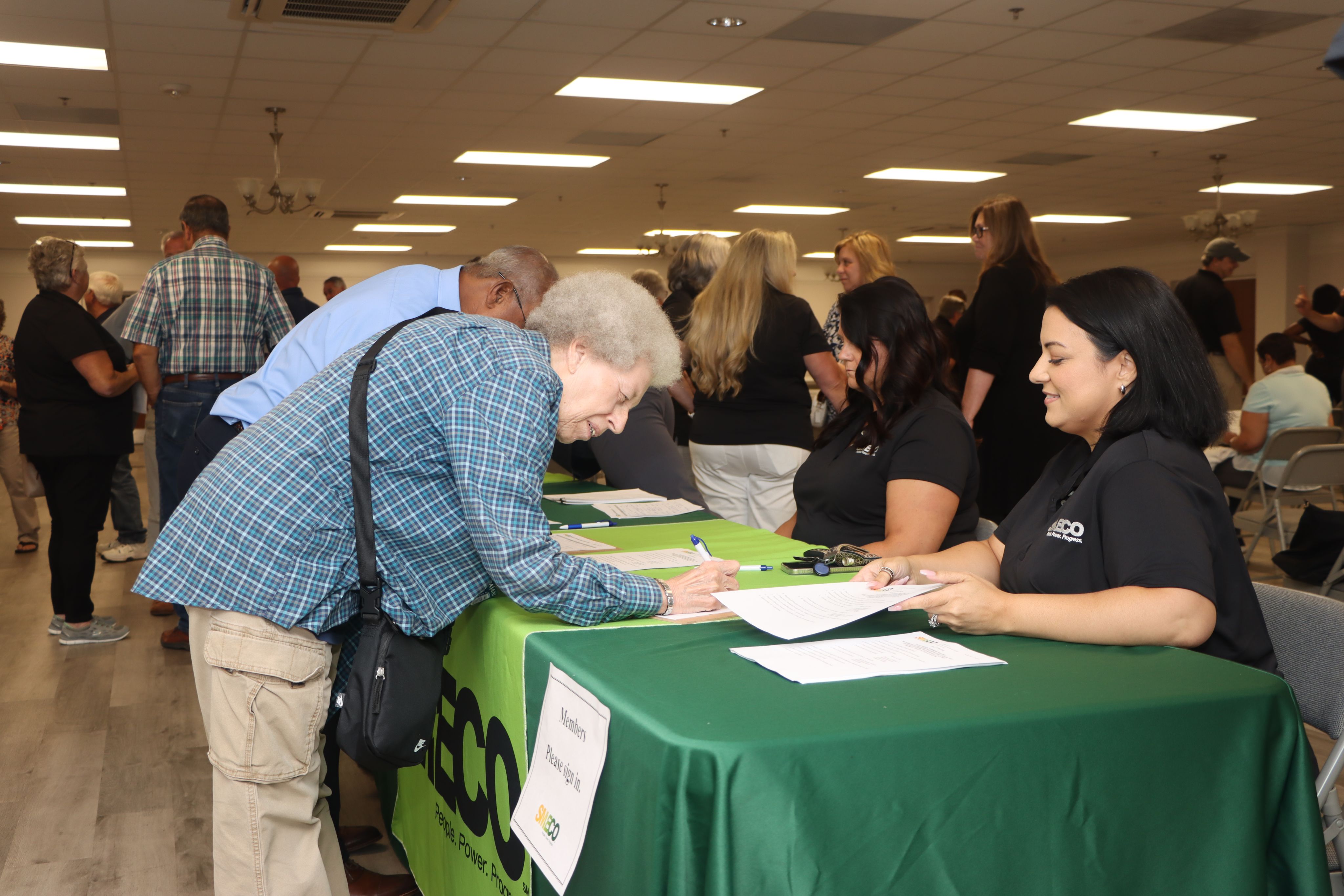 Cooperative member signing in for the 2023 Annual Meeting.